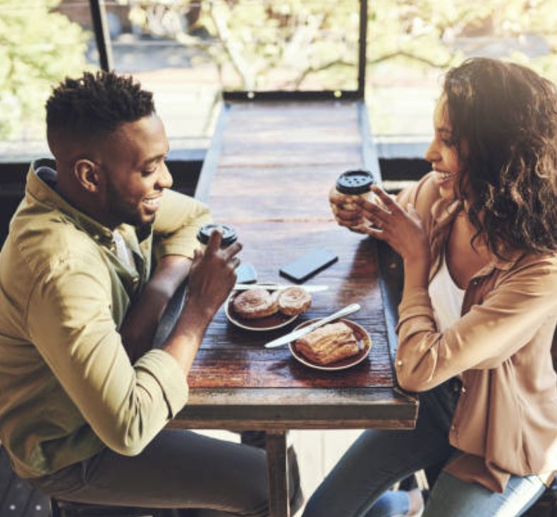 Date with a man and a woman in a coffee shop. 